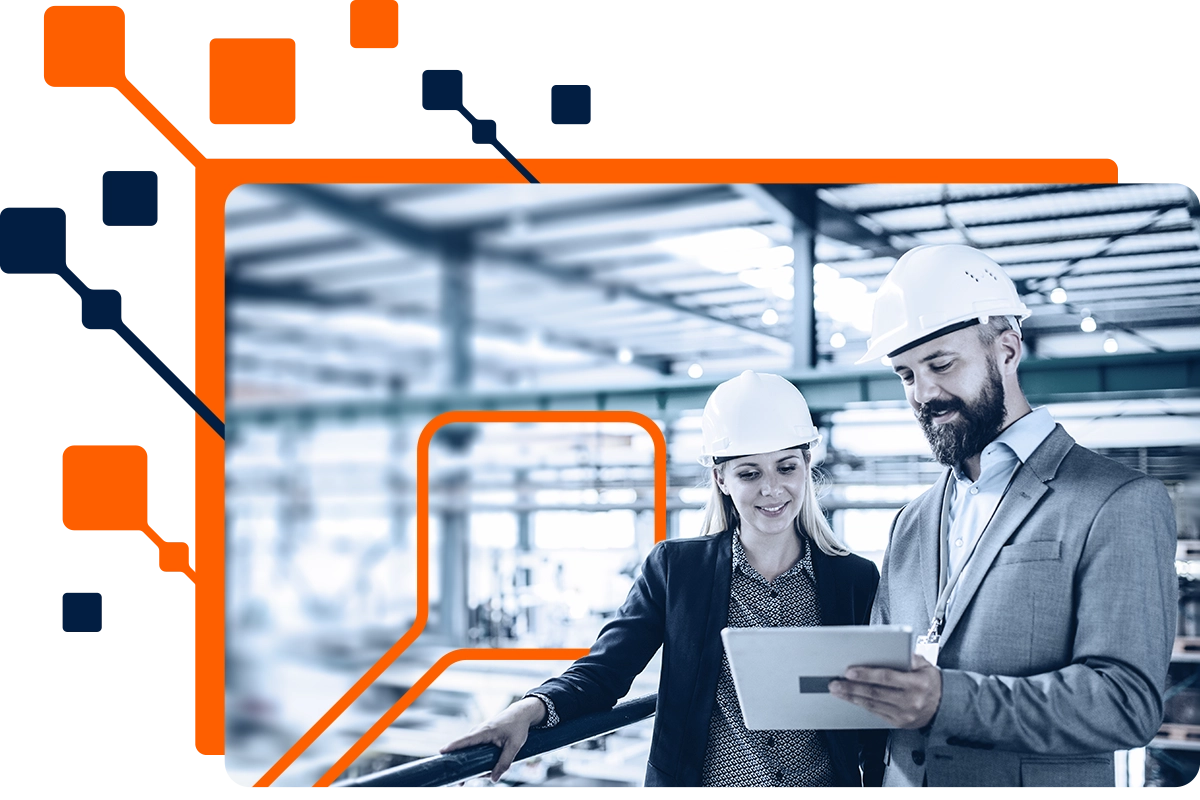 a mature industrial man and woman engineer with tablet in a factory, working.